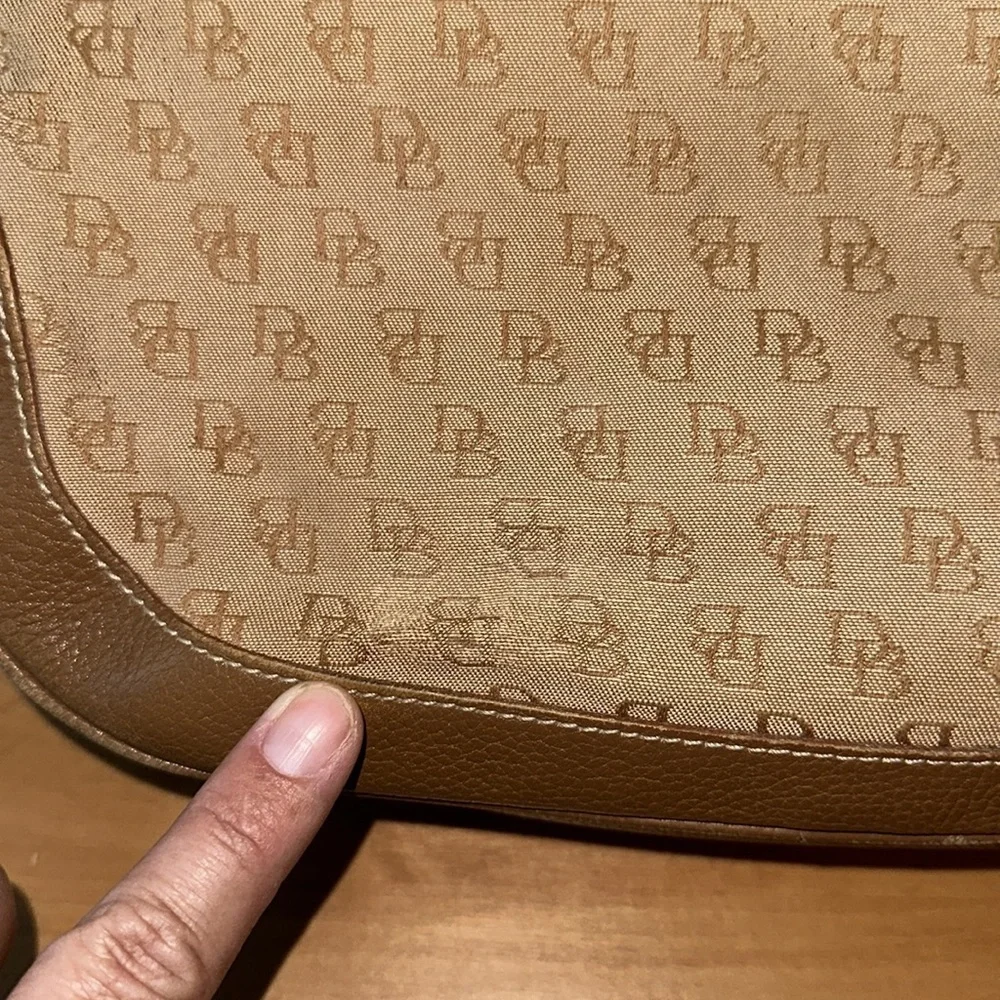 Dooney and Bourke classic monogram canvas and leather Tan color small hobo bag